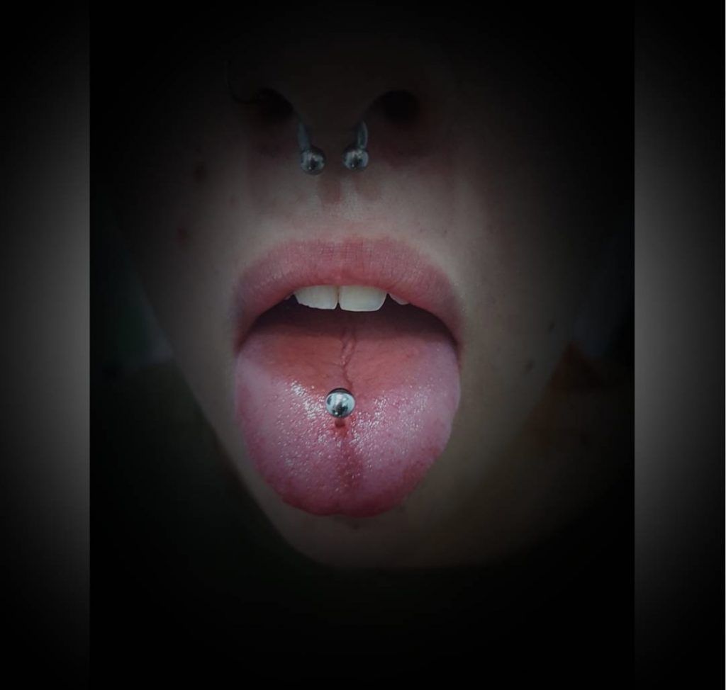 Piercings Lengua – El arte del buho